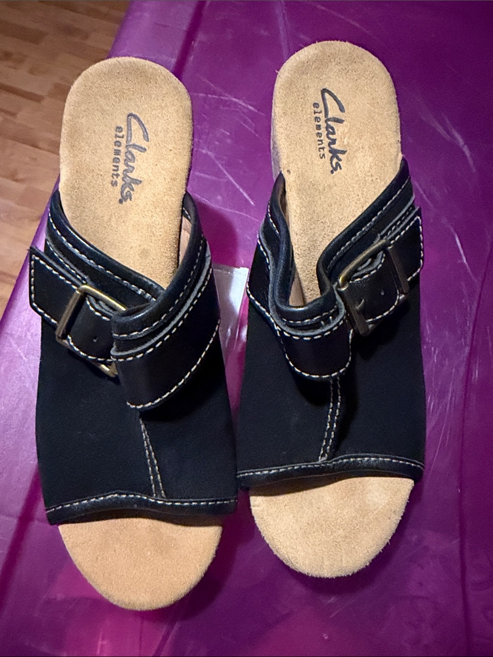 Clarks Black Open-Toe Wedge Mules with Buckle Detail